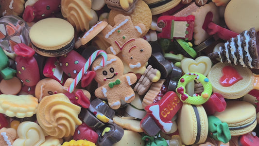 Gingerbread man and woman Christmas tree and candy mix
