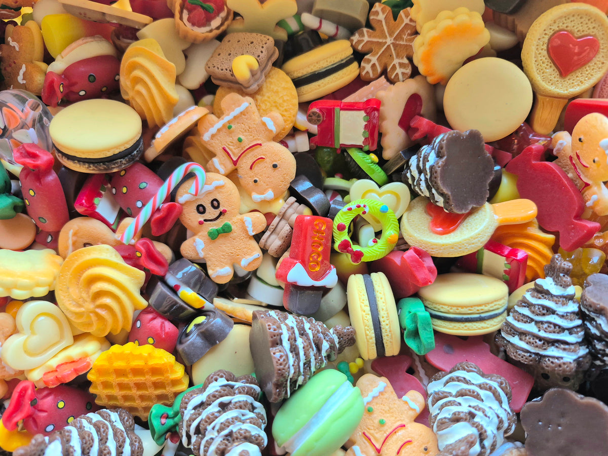 Gingerbread man and woman Christmas tree and candy mix