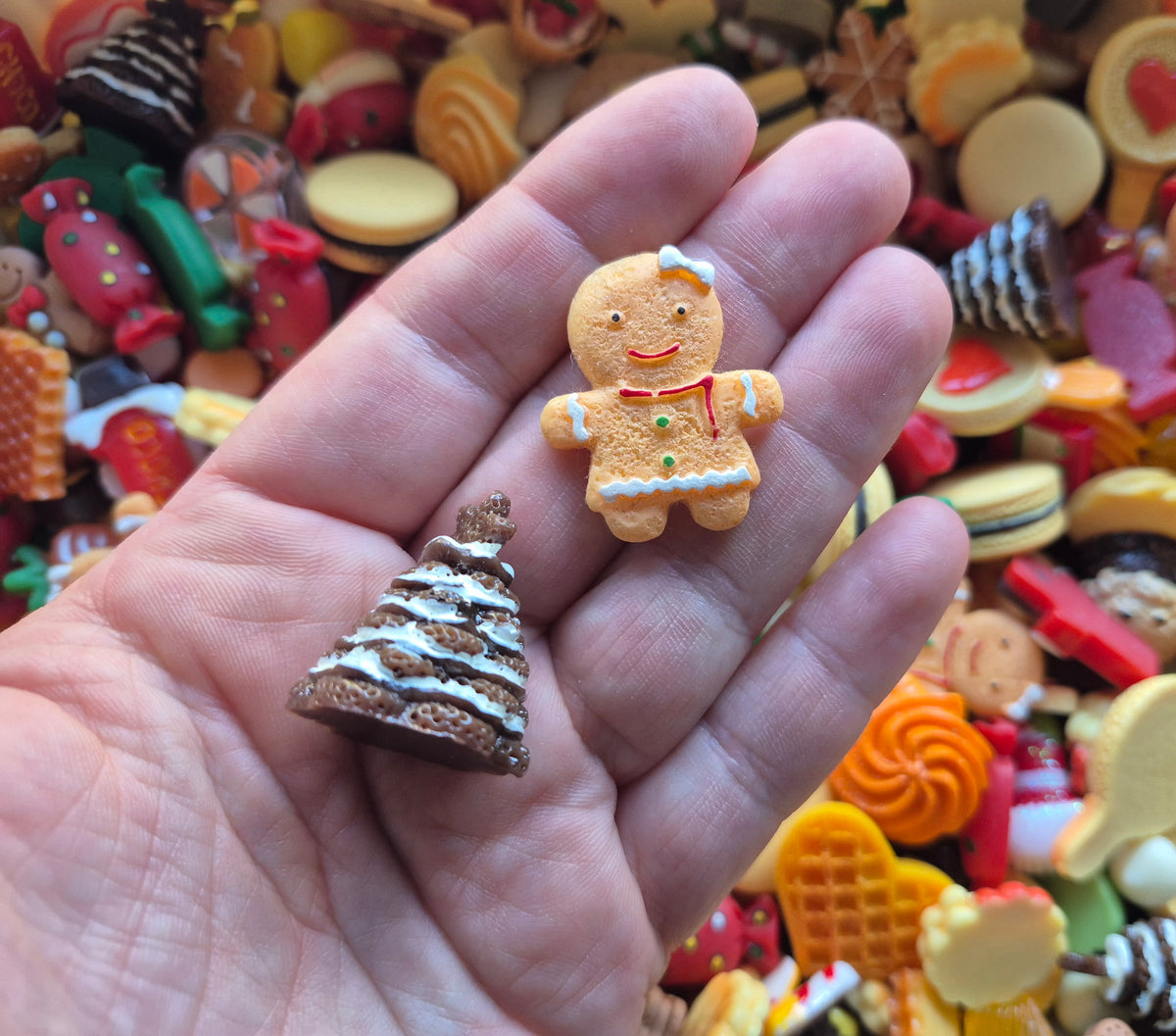 Gingerbread man and woman Christmas tree and candy mix