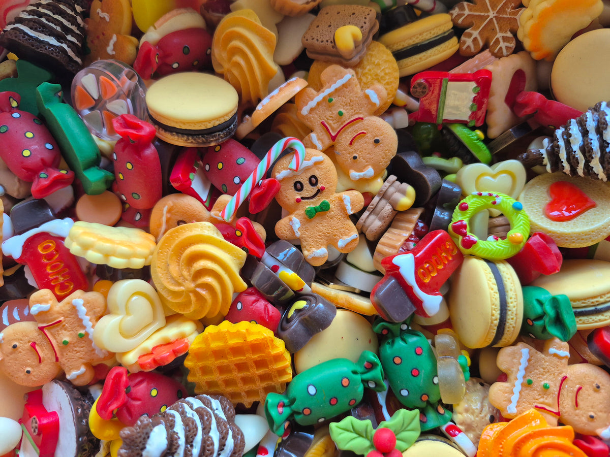 Gingerbread man and woman Christmas tree and candy mix