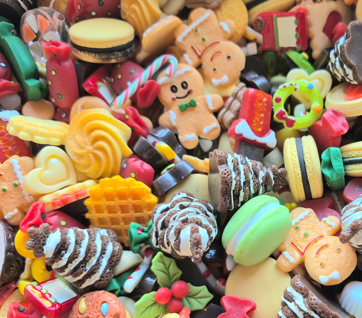 Gingerbread man and woman Christmas tree and candy mix