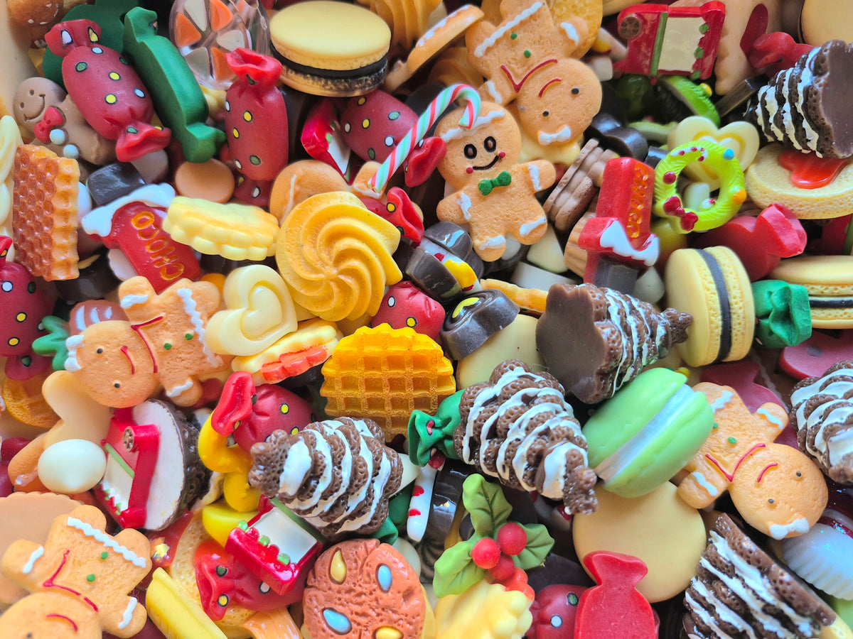 Gingerbread man and woman Christmas tree and candy mix