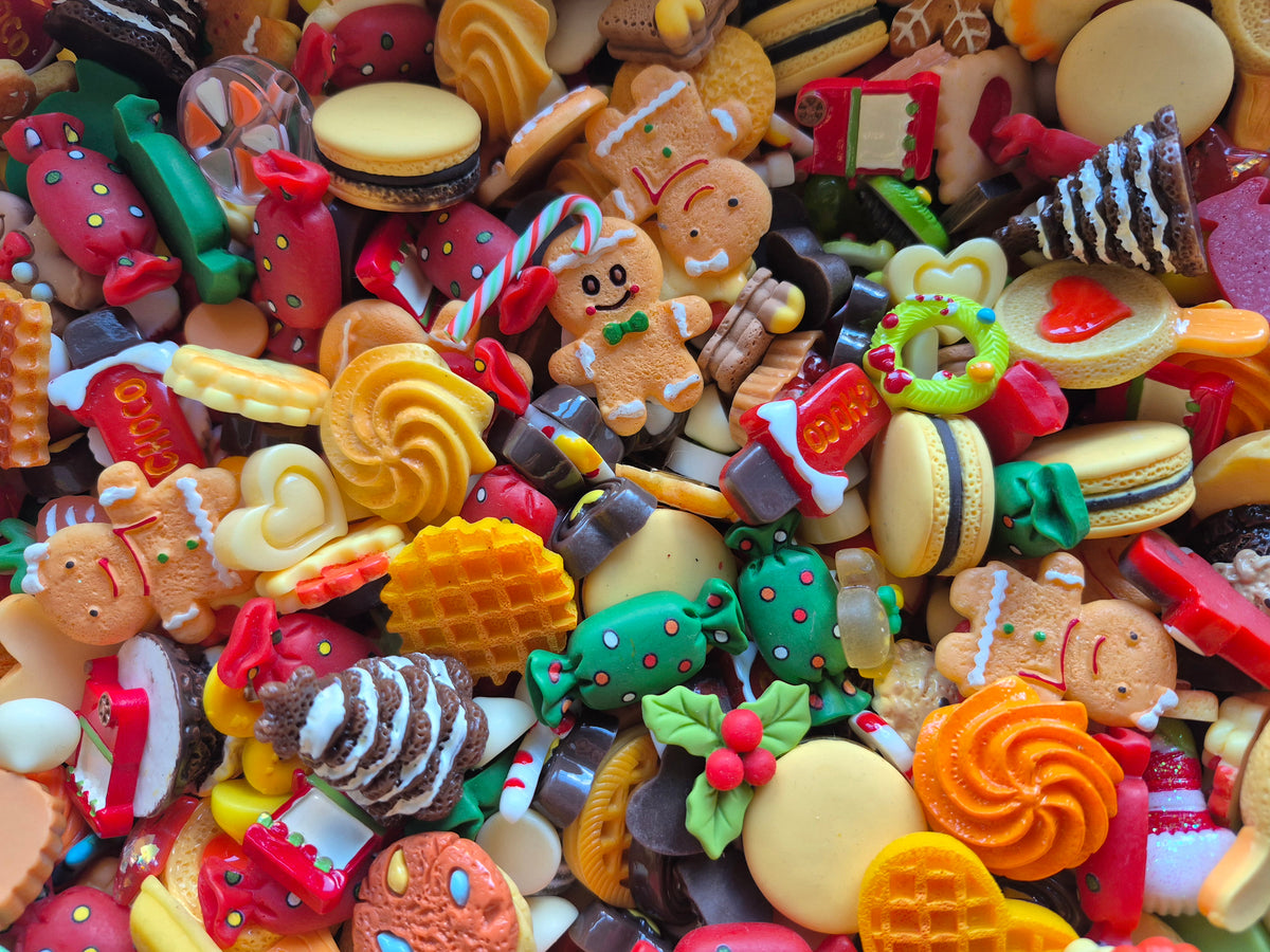 Gingerbread man and woman Christmas tree and candy mix