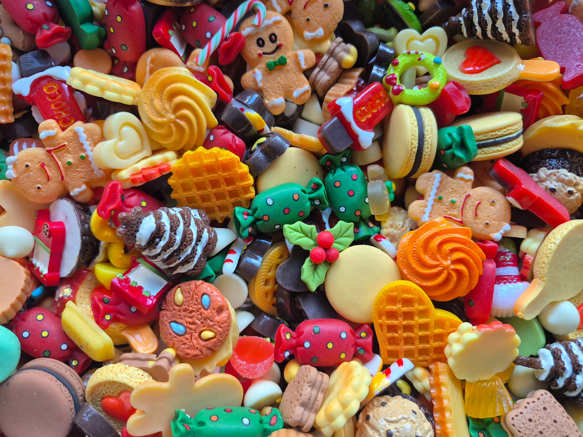 Gingerbread man and woman Christmas tree and candy mix